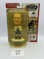 Front view of sealed Mats Sundin bobblehead in cracked blister packaging