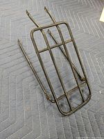 Front angled view of black steel rear bicycle rack