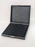 Case open showing interior foam insert grid