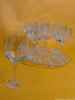 Group shot of seven glasses and oval tray