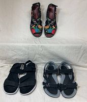 Three pairs – embroidered wedges and two sport sandals