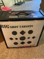 Front face with bullseye pattern and brand