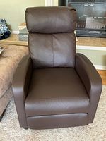 Front view of brown faux leather recliner