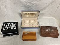 Four jewelry boxes grouped together, showing sizes and styles