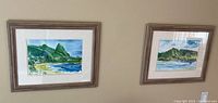 Both framed watercolors on wall