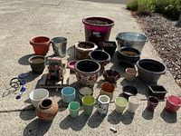 Wide shot of all planters laid out on driveway