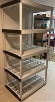 Front angled view of five-tier plastic shelving unit