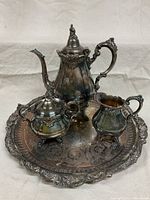 Full view of all four Wallace Baroque pieces on tray