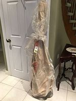 Full bolt wrapped in plastic on cardboard tube