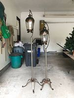 Both floor lanterns on stands in full view