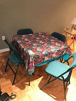 Table with four matching folding chairs