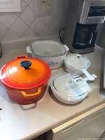 All cookware grouped on counter