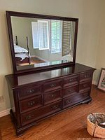 Front view of dresser with attached mirror