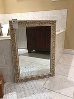 Full view of mirror front showing frame and glass