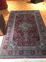 Full view of rug showing pattern, size and colors