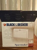 Front of unopened box showing Black & Decker branding and product image