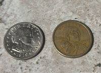 Both coins side by side showing obverse designs