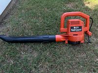 Full view of Black & Decker Yard Cleaner blower with nozzle attached on grass