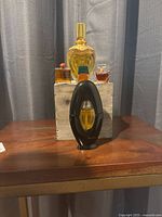 All fragrance bottles arranged with wood box