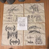 All four pillow covers with information sheet displayed on floor