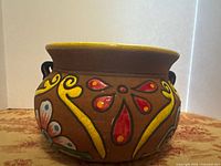 Front view of Talavera planter showing overall shape, colour and handles