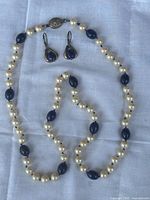 Full view necklace and earring pair