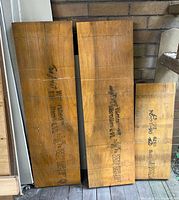 Front view of three LVL offcuts standing upright