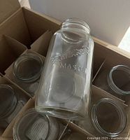 Embossed Bernardin mason jar displayed above box separator