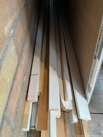 Stack of assorted molding and MDF strips