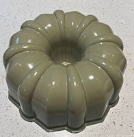 Top view showing avocado exterior and fluted design