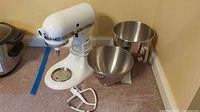 Mixer with both bowls and paddle