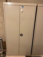 Front view of closed metal cabinet