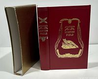 Book standing beside slipcase, front and spine visible