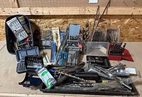 Wide view of entire lot of bits and cases