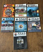 All seven magazines laid out on floor