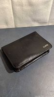 Closed black zippered Curtis case