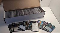 Open 800-count storage box nearly full of cards with sample cards displayed