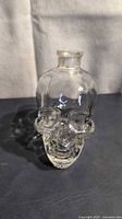 Front view of clear skull bottle