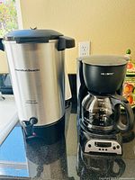Front view of both coffee appliances side by side