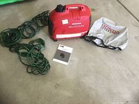 Generator front and side view with accessories