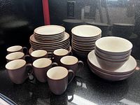 Full set showing plates, bowls and mugs