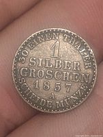 Reverse showing denomination, date 1857, mint mark A, legends