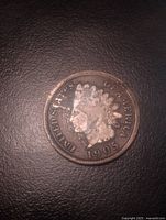 Obverse showing date 1905 and silver overlay