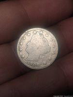 Obverse of 1906 Liberty Head V nickel showing Liberty profile, stars, date