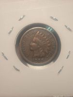 Obverse of 1907 Indian Head cent in 2x2 holder
