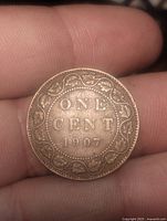 Reverse side showing ONE CENT 1907 with maple leaf wreath