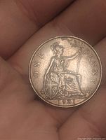 Reverse showing seated Britannia, denomination and date