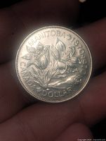 Reverse showing prairie crocus design and legends