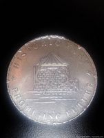 Obverse showing Kingston 1673-1973 design and motto