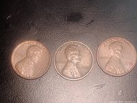 Obverse of three Lincoln cents dated 1978, 1930, 1976